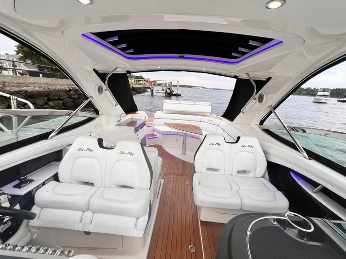  Yacht Photos Pics 2014 Sea Ray 350 SLX luxury boat interior with white seating and wood flooring.