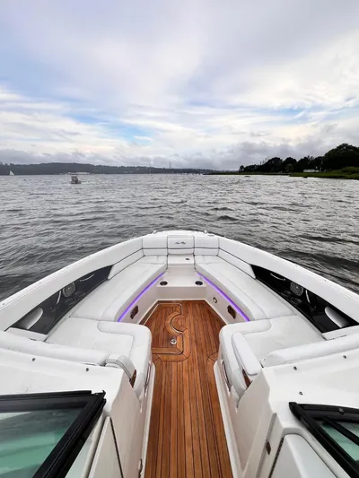  Yacht Photos Pics 2014 Sea Ray 350 SLX boat on water, featuring sleek design and spacious deck.