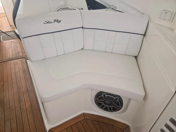  Yacht Photos Pics White leather seating on 2014 Sea Ray 350 SLX boat with wood flooring.