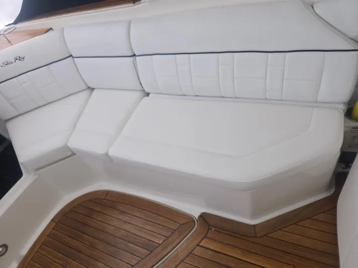  Yacht Photos Pics White leather seating on 2014 Sea Ray 350 SLX boat with teak flooring.