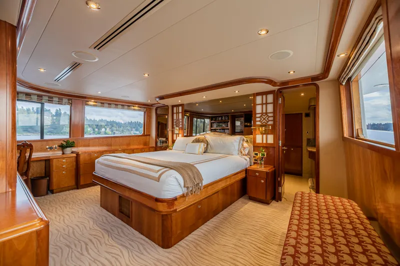 Serengeti Yacht Photos Pics Luxurious master bedroom on a 2002 Westport Flybridge yacht with scenic window views.
