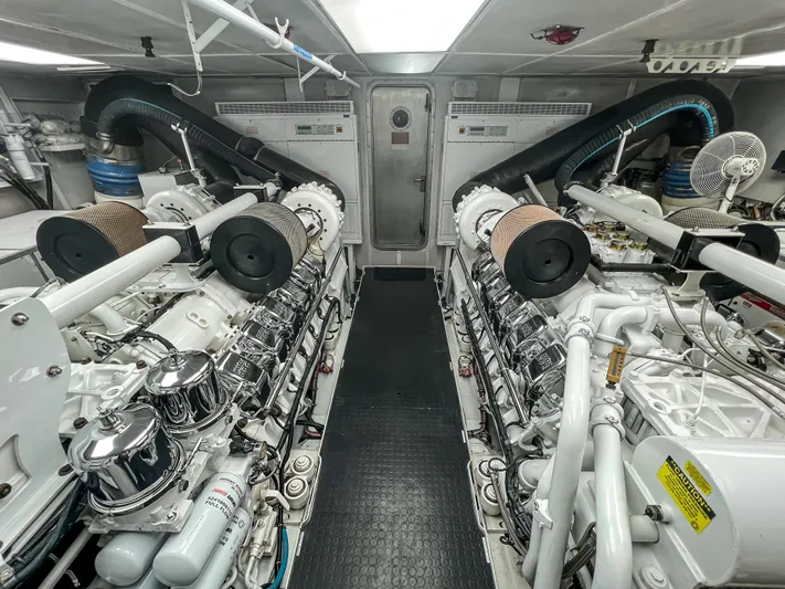 Serengeti Yacht Photos Pics Engine room of a 2002 Westport Flybridge yacht with dual engines.