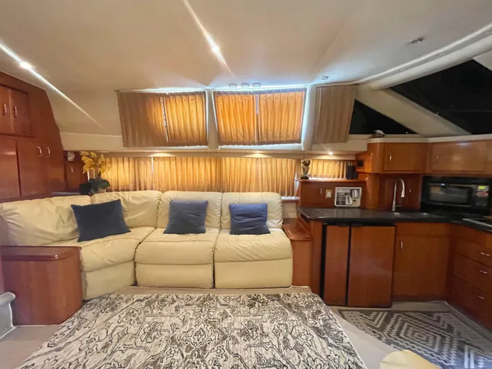  Yacht Photos Pics Luxurious interior of 2004 Carver 44 Cockpit Motor Yacht with plush seating and modern amenities.