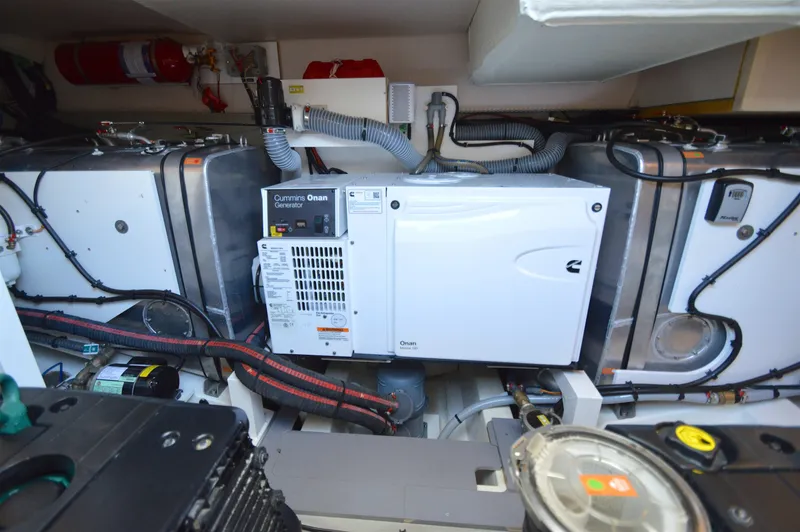 Yore Amuche Yacht Photos Pics Engine room of 2019 Prestige 520S yacht with Cummins Onan generator and equipment.