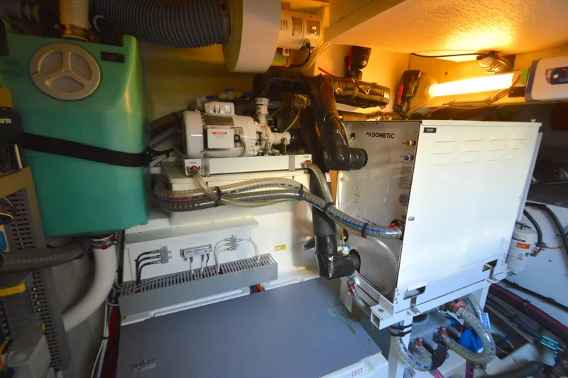 Yore Amuche Yacht Photos Pics Engine room of a 2019 Prestige 520S yacht with mechanical equipment and piping.
