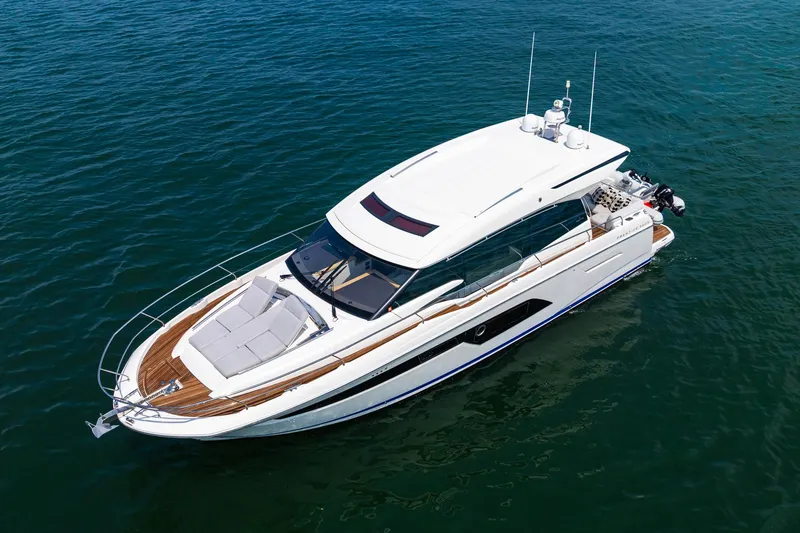 Yore Amuche Yacht Photos Pics 2019 Prestige 520S yacht cruising on open water, showcasing sleek design and luxury features.