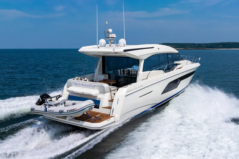 Yore Amuche Yacht Photos Pics 2019 Prestige 520S yacht cruising on open water, featuring sleek design and luxury amenities.