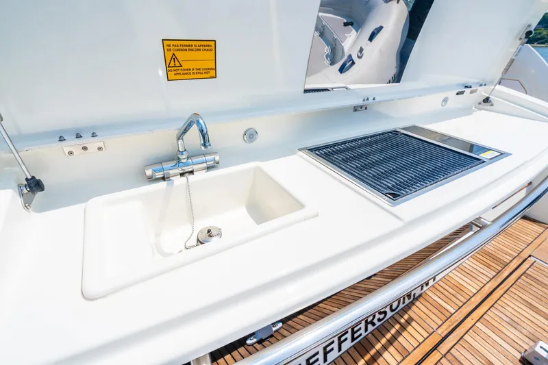 Yore Amuche Yacht Photos Pics Outdoor kitchen on 2019 Prestige 520S yacht with sink and grill.