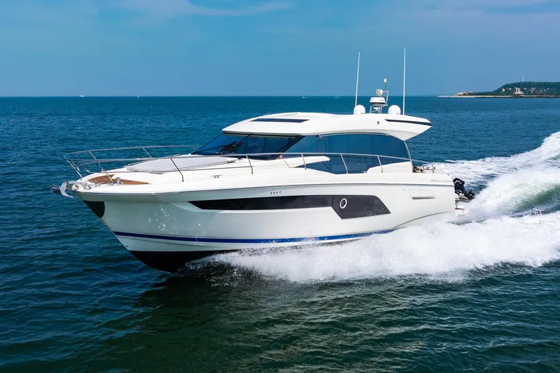 Yore Amuche Yacht Photos Pics 2019 Prestige 520S yacht cruising on open sea, showcasing sleek design and luxury features.