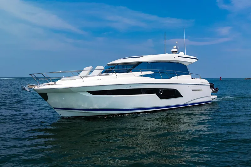 Yore Amuche Yacht Photos Pics 2019 Prestige 520S yacht cruising on open water under a clear blue sky.