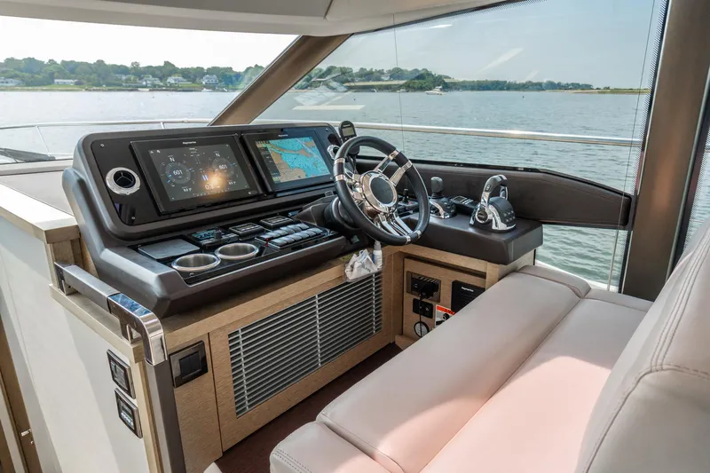 Yore Amuche Yacht Photos Pics Luxurious 2019 Prestige 520S yacht helm with advanced navigation systems and plush seating.