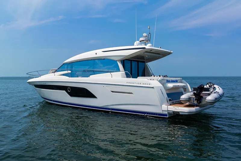 Yore Amuche Yacht Photos Pics 2019 Prestige 520S yacht on open water, showcasing sleek design and luxury features.