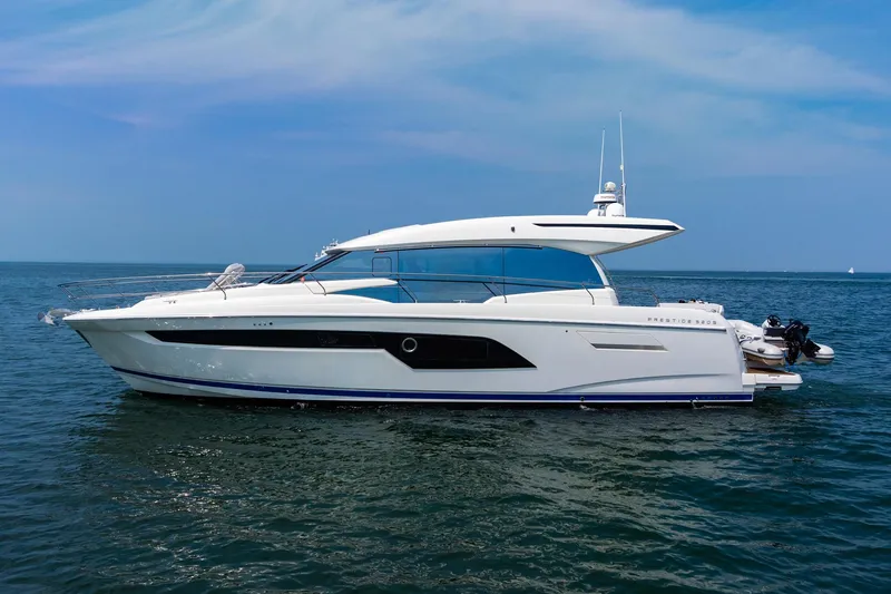 Yore Amuche Yacht Photos Pics 2019 Prestige 520S yacht on calm ocean waters under a clear sky.