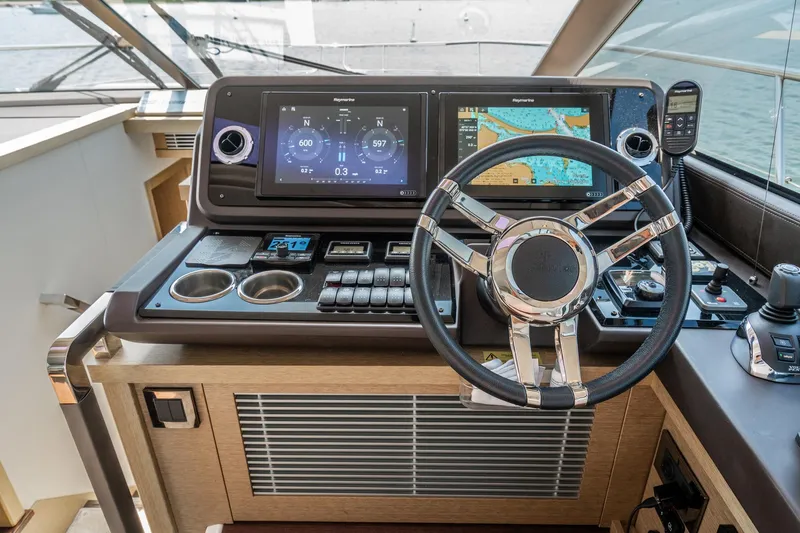 Yore Amuche Yacht Photos Pics Helm of 2019 Prestige 520S yacht with navigation screens and controls.