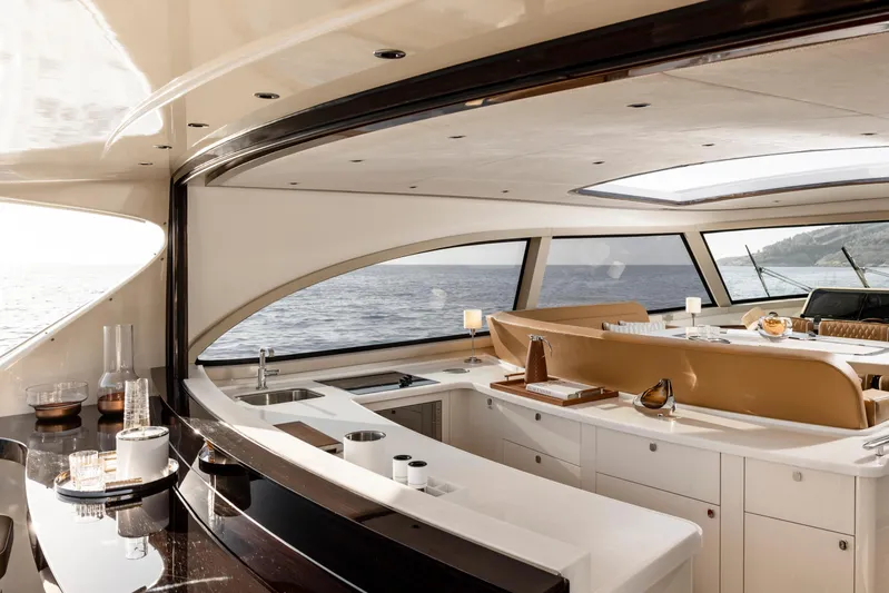Tons Of Fun Yacht Photos Pics Luxurious interior of 2022 Zeelander Z72 yacht with ocean view and elegant design.