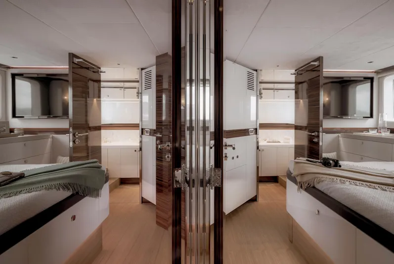 Tons Of Fun Yacht Photos Pics Luxurious interior of 2022 Zeelander Z72 yacht, featuring elegant wood finishes and modern design.