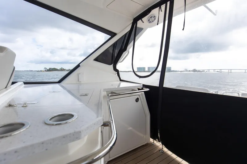  Yacht Photos Pics Interior view of 2023 Aquila 36 Sport yacht with ocean backdrop.