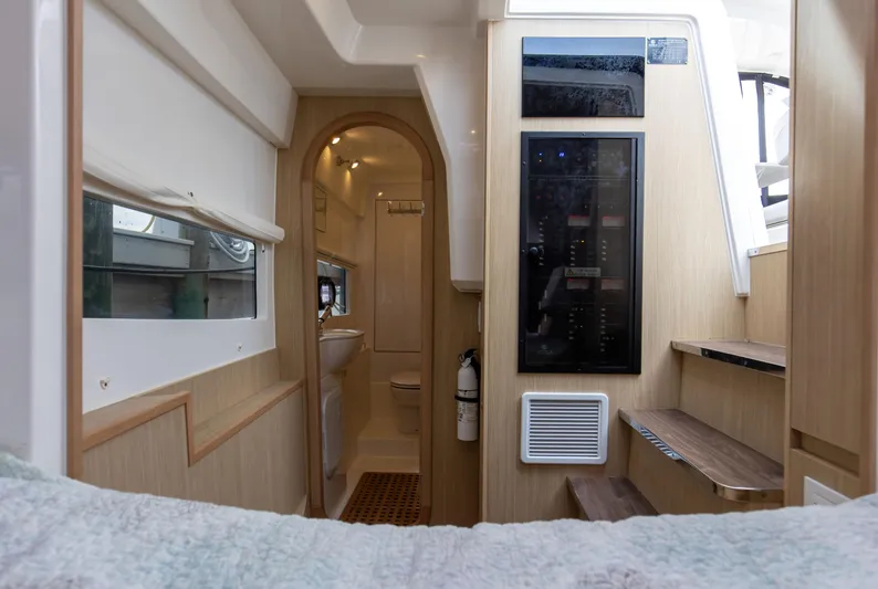  Yacht Photos Pics Interior of 2023 Aquila 36 Sport yacht, featuring modern design and wooden finishes.