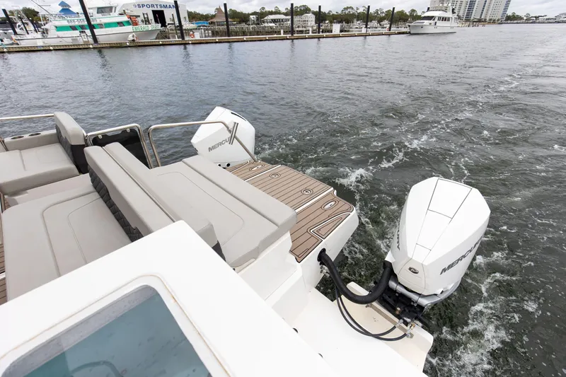  Yacht Photos Pics 2023 Aquila 36 Sport boat with Mercury engines on water.