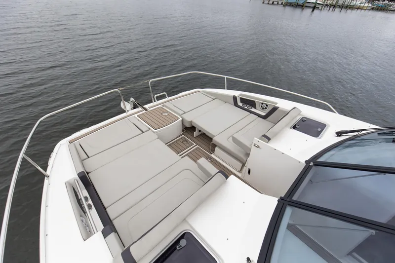 Yacht Photos Pics Aquila 36 Sport 2023 boat with spacious deck seating on calm water.