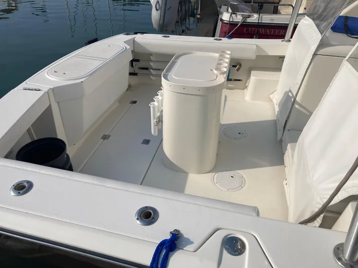 Alibi Yacht Photos Pics 2006 Rampage Express Offshore Tower boat interior with seating and storage compartments.