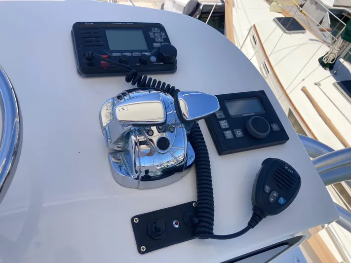 Alibi Yacht Photos Pics Control panel of a 2006 Rampage Express Offshore Tower boat with communication devices.