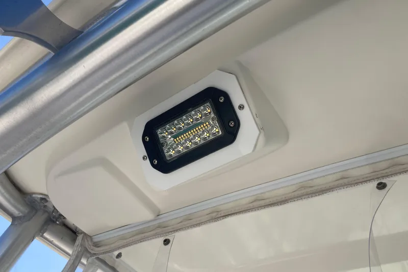 Alibi Yacht Photos Pics LED light fixture on 2006 Rampage Express Offshore Tower boat ceiling.