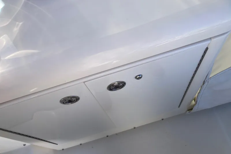 Alibi Yacht Photos Pics 2006 Rampage Express Offshore Tower boat interior storage compartment.