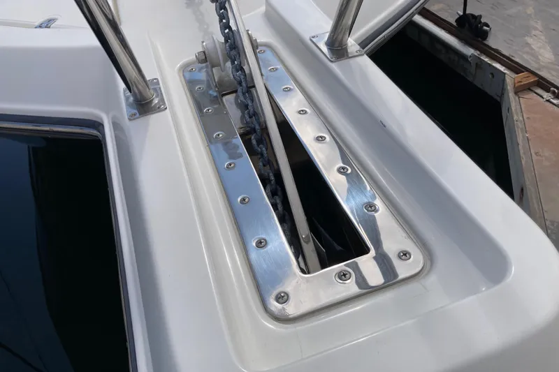 Alibi Yacht Photos Pics Anchor chain mechanism on 2006 Rampage Express Offshore Tower boat.