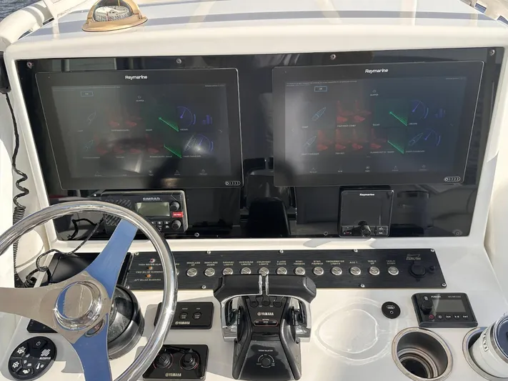  Yacht Photos Pics Helm of 2017 Buddy Davis 34 boat with dual Raymarine displays and Yamaha controls.