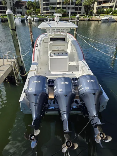  Yacht Photos Pics 2017 Buddy Davis 34 boat with triple Yamaha 300 engines docked in marina.