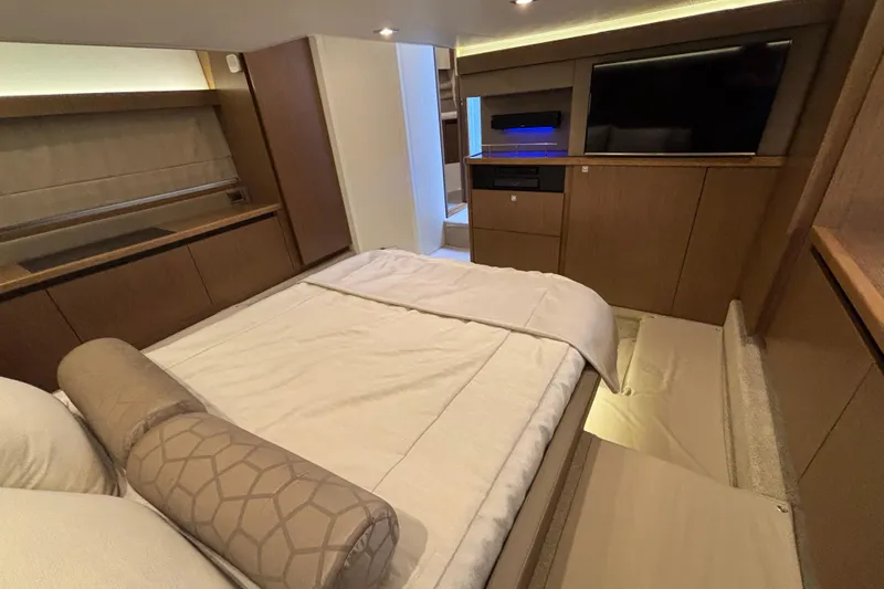 Cop Out II Yacht Photos Pics Luxurious interior of 2018 Sea Ray Sundancer 460 yacht with modern bedroom amenities.