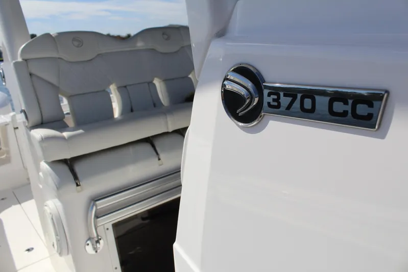  Yacht Photos Pics Edgewater 370CC 2019 boat interior with seating and logo detail.
