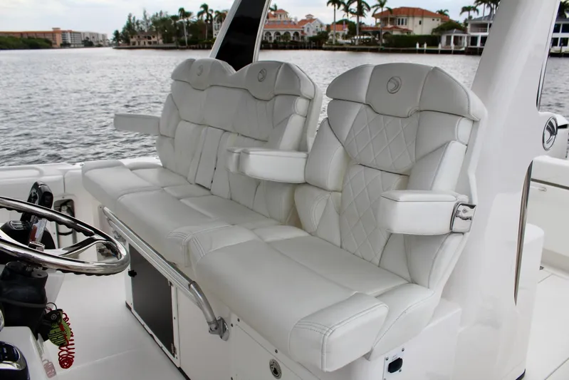  Yacht Photos Pics Luxurious seating on 2019 Edgewater 370CC boat with waterfront view.