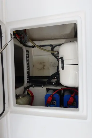  Yacht Photos Pics 2019 Edgewater 370CC boat compartment with batteries and equipment.