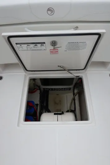  Yacht Photos Pics Open hatch of 2019 Edgewater 370CC boat showing internal compartment.