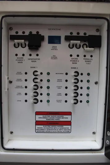  Yacht Photos Pics Electrical panel of 2019 Edgewater 370CC boat, showing circuit breakers and controls.