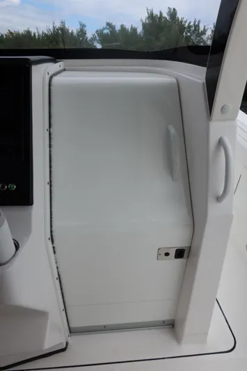  Yacht Photos Pics 2019 Edgewater 370CC boat cabin door with sleek white design.