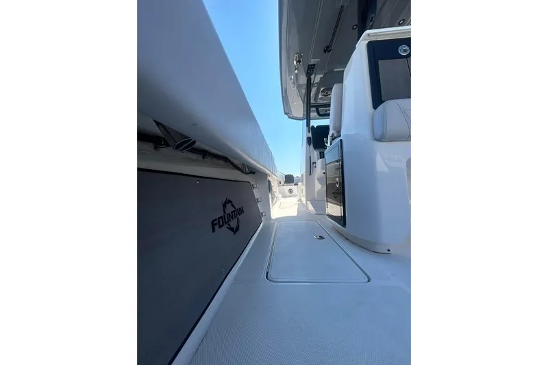  Yacht Photos Pics 2023 Fountain 38TE CC boat interior, showcasing sleek design and modern features.
