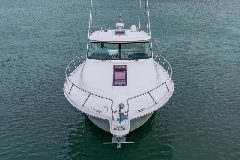 Wahoo Yacht Photos Pics 2009 Tiara Yachts 39 Open boat on calm water, front view.
