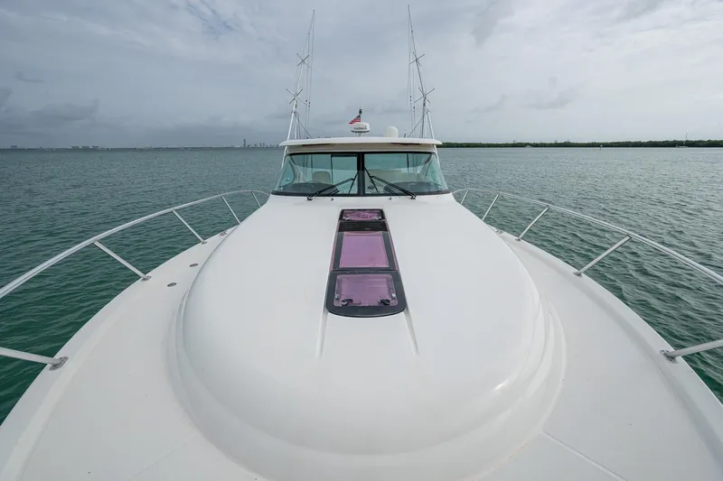 Wahoo Yacht Photos Pics 2009 Tiara Yachts 39 Open on calm water, showcasing sleek design and spacious deck.
