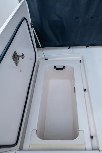 Wahoo Yacht Photos Pics 2009 Tiara Yachts 39 Open storage compartment with open hatch.