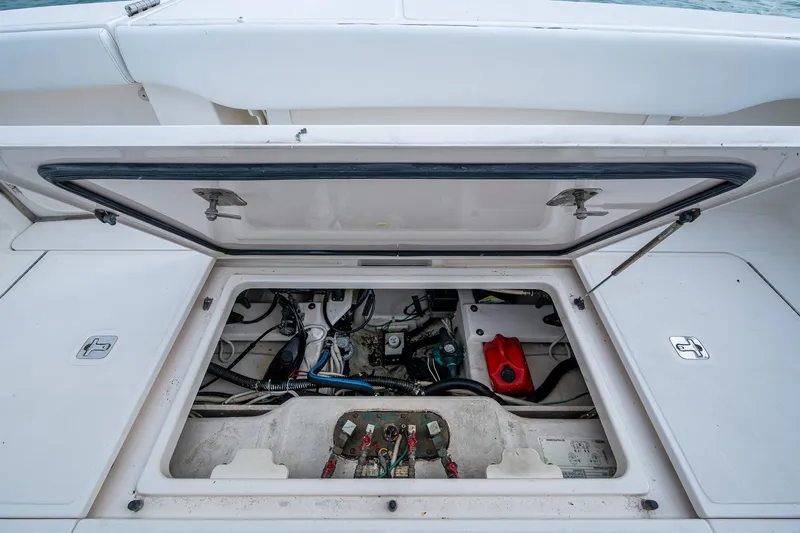 Wahoo Yacht Photos Pics 2009 Tiara Yachts 39 Open engine compartment with open hatch, showcasing internal components.