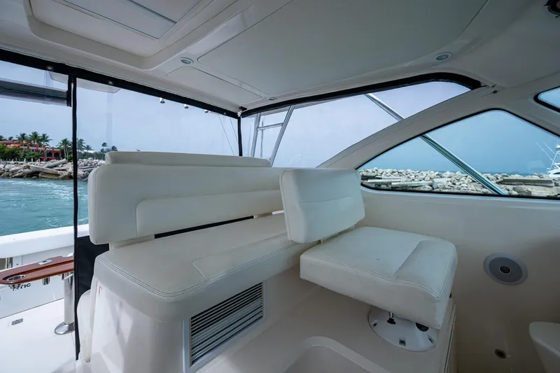 Wahoo Yacht Photos Pics 2009 Tiara Yachts 39 Open interior with white seating and ocean view.