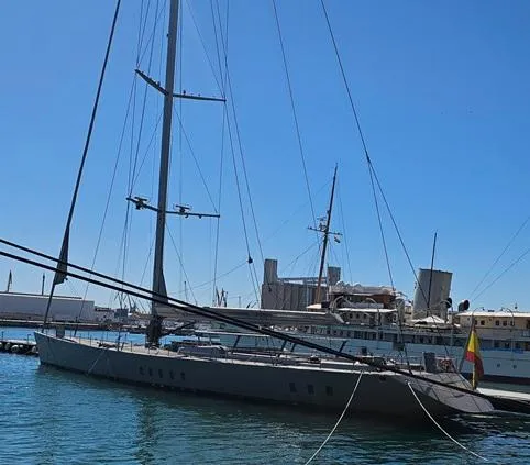 Syl Yacht Photos Pics Sleek 2003 Custom SYL sports yacht docked in sunny marina.