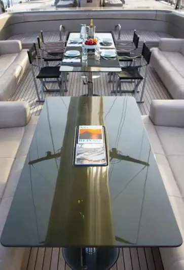 Syl Yacht Photos Pics Luxurious yacht dining area with elegant tables and seating, Custom SYL - BARCOS DEPORTIVOS, 2003.
