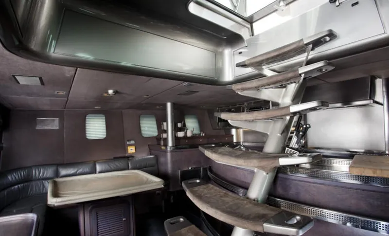 Syl Yacht Photos Pics Interior of a 2003 Custom SYL sports boat with modern design and spiral staircase.