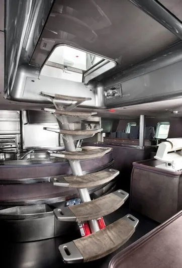 Syl Yacht Photos Pics Interior of 2003 Custom SYL sports boat with modern spiral staircase.