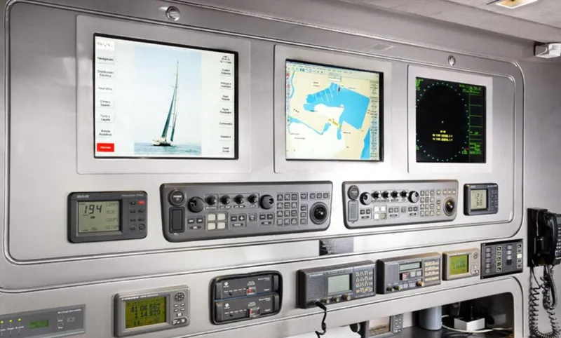 Syl Yacht Photos Pics Control panel of a 2003 Custom SYL - BARCOS DEPORTIVOS yacht with navigation screens.