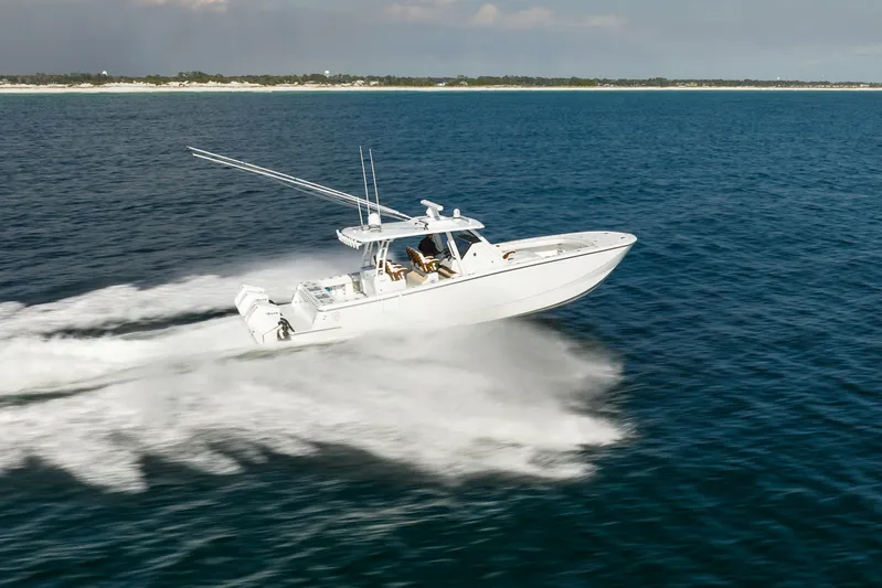 Slowmocean Yacht Photos Pics 2021 Barker Boatworks 40 HPC speeding on open water, showcasing sleek design and performance.